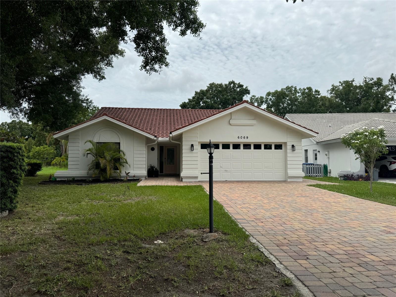 Welcome to this beautifully appointed 3 bedroom, 2 bathroom residence, in a quiet cul-de-sac. Enjoy the convenience of being close to University Pkwy, UTC Mall, and various restaurants. The interior boasts a bright and airy open-concept living area, featuring tile flooring throughout, shaker-style cabinets, stainless steel appliances, and a huge kitchen island with marble countertops. The master bedroom offers a walking closet and an elegant en-suite bathroom with a double vanity, marble top, and a relaxing tub and shower combination. Two additional bedrooms and a second full bathroom complete the interior layout. Outdoor Oasis: Incredible outdoor space perfect for entertaining, Heated pool, Expansive sun-kissed terrace with ample seating and lounging areas, Outdoor shower. Additional Features: Cul-de-sac location for added privacy, Close proximity to University Pkwy and UTC Mall.