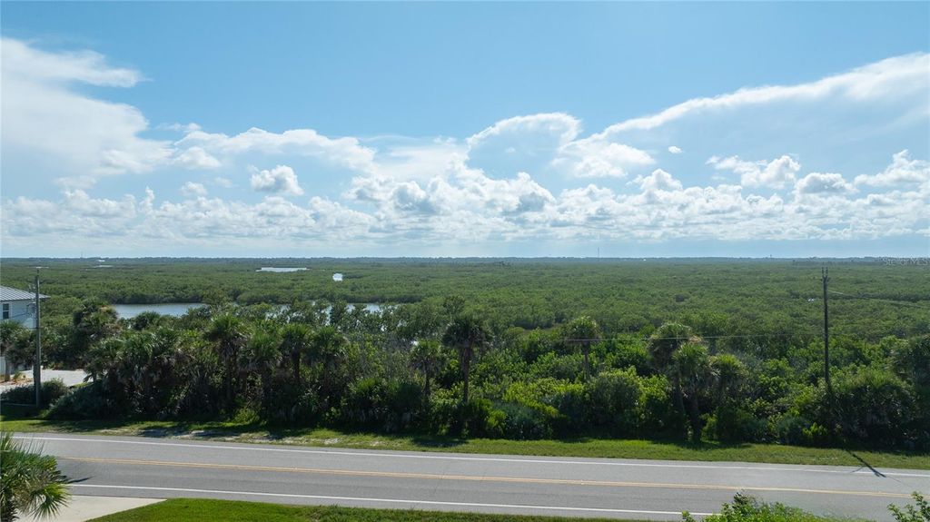 Photo of 6000 S Atlantic Avenue, New Smyrna Beach, FL 32169 (MLS # O6407832)
