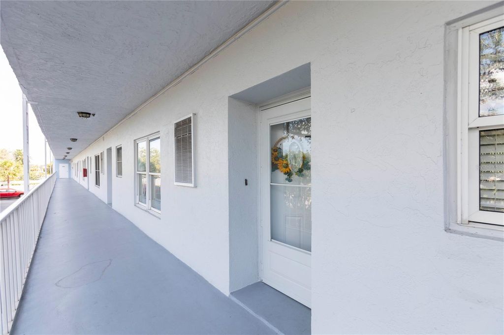 Photo of 4939 Floramar Terrace #203, New Port Richey, FL 34652 (MLS # W7876762)