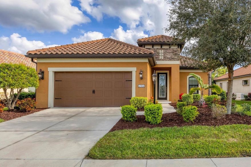 THIS BEAUTIFUL HOME IS LEAST EXPENSIVE "WHITE STAR" MODEL IN MILANO.  Welcome to this Tuscan-themed exquisite 2065 sq ft, 3 Bedroom, 2 1/2 Bath, 2-car home.  Situated on a greenbelt conservation lot in Milano, a very desirable resort-style neighborhood in Nokomis.  This is a very active community, with a life style director who works very hard to offer a plethora of activities to those who are interested.  Regardless of your interest, it's pretty certain that at least one or more of the offerings will arouse your interest.  While you're visiting Milano, stop at the clubhouse to peruse the monthly schedule.  From the day the current sellers moved in to this beautiful home, pride of ownership has been quite evident.  As you enter this " White Star" home by Neal Communities, you will see and understand.  The beautiful hurricane glass front entry door has an electronic keyless lock.  The impressive long entry foyer leads your focus to the paver lanai with the wooded conservation area in the back.  The first room on the right passed the double doors is the private den/study that features a beautiful wood floor.  This room has crown molding and plantation shutters on the 3 windows.  In fact, every room in the house has crown molding and every window has plantation shutters.  When you go a little further down the entryway, you'll come to the island Kitchen with granite counters.  Across from the island you'll see granite counters, 42' white cabinets, custom backsplash going right into the Butler's Pantry.  The 5-burner GE self-clean gas range has an over the range microwave.  All bottom cabinets in the Kitchen, Butlers' Pantry and the Master Bath have convenient pull-out drawers.  The island has 2 pendant lights.  There is a 1-year new LG Stainless Steel French Door Refrigerator in Kitchen and a GE side x side in the garage.  The 1st thing you see in the dining room is the brand new crystal chandelier.  You'll also notice that the entire house has 5 1/4" base-boards, has 9'4" ceilings and a tray ceiling in the Family Room.  When you enter the 16 x 14 Master Bedroom En suite, you'll find carpeting and plenty of light with the 3 windows.  The attached bath has a double sink vanity and a large glass-enclosed shower.  Adjacent the shower is private water closet and linen closet.  At the end of the en suite is a 6 x 11 carpeted closet,  that's setup with hanging on one side and shelving on the other.  The other two carpeted bedrooms are 12 X 11.  At the end of the hallway is the Laundry, featuring a large vanity and sink, four large wall cabinets over a Whirlpool washer and gas dryer. the 24x22 extended Lanai features pavers, a tv wall hanger and 3 power roll-up hurricane screens. There is a remote control that operates the 3 transparent screens separately.  This means that if the screens are down during a storm, the interior of the house won't be dark during the day.  The two-car a garage has 2 ceiling mounted steel  4 X 8 storage bins that are great for storing XMAS decorations, suite cases, ice chests, fishing rods, pool noodles and the like.  As you  know, when you live in Florida, storage space is always at a premium.  There are also six ceiling fans.  This home and neighborhood offer a  wonderful opportunity to live "the good life". It fills many folks wants and needs list.  Does it fill yours?