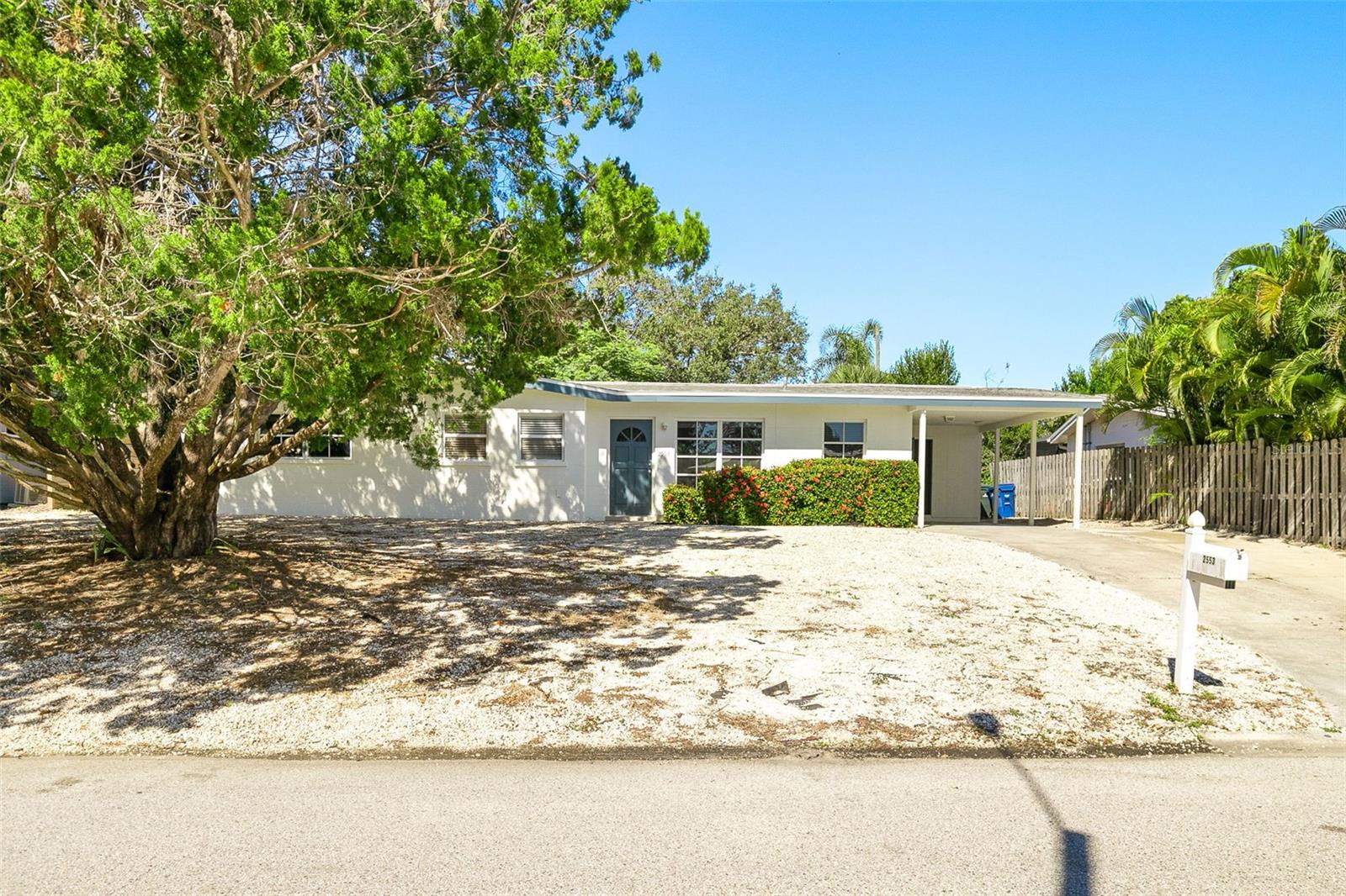 This charming 3-bedroom, 2-bathroom mid-century home perfectly captures the timeless appeal of old Sarasota style. Built in 1956, the residence is nestled on a generous .2-acre lot within the highly sought-after South Gate neighborhood. The home showcases classic architectural details that evoke a warm and inviting ambiance, while offering plenty of potential for personalization and modern updates. Recent improvements include a 7-year-old roof and updated plumbing, providing peace of mind and added value. With spacious living areas and a serene outdoor setting, this property presents an exceptional opportunity to own a piece of Sarasota's heritage in a prime location. Whether you're looking to enjoy the quiet neighborhood charm or explore creative renovation possibilities, 2553 Tulip Street is ready to welcome you home.