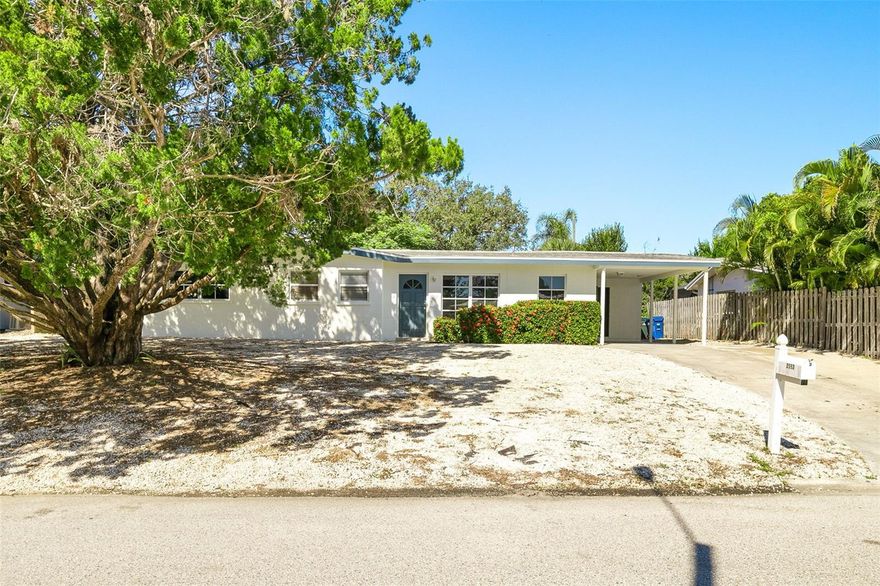 This charming 3-bedroom, 2-bathroom mid-century home perfectly captures the timeless appeal of old Sarasota style. Built in 1956, the residence is nestled on a generous .2-acre lot within the highly sought-after South Gate neighborhood. The home showcases classic architectural details that evoke a warm and inviting ambiance, while offering plenty of potential for personalization and modern updates. Recent improvements include a 7-year-old roof and updated plumbing, providing peace of mind and added value. With spacious living areas and a serene outdoor setting, this property presents an exceptional opportunity to own a piece of Sarasota's heritage in a prime location. Whether you're looking to enjoy the quiet neighborhood charm or explore creative renovation possibilities, 2553 Tulip Street is ready to welcome you home.