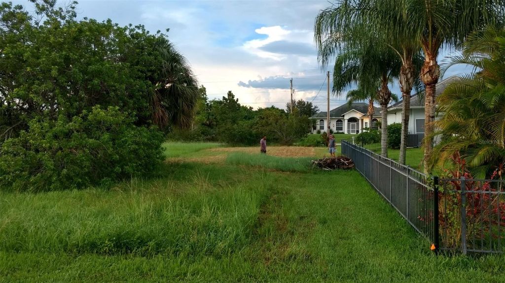 Photo of 670 Mirror Lakes Court, Lehigh Acres, FL 33974 (MLS # O6249130)