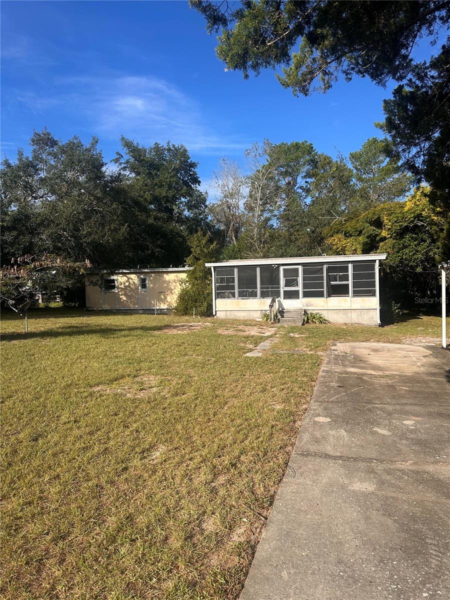 Photo of 8323 Evergreen Ave, Brooksville, FL 34613 (MLS # W7889946)