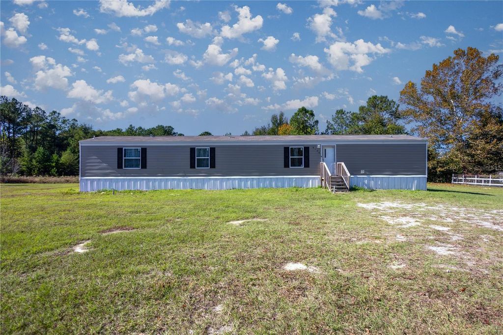 Photo of 6170 SE 220th Avenue, Morriston, FL 32668 (MLS # OM719460)