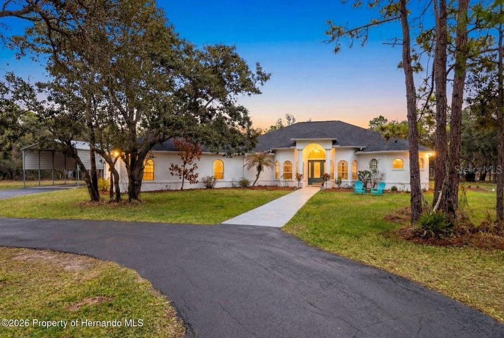 Photo of 12124 Squeeze Avenue, Brooksville, FL 34614 (MLS # W7883632)