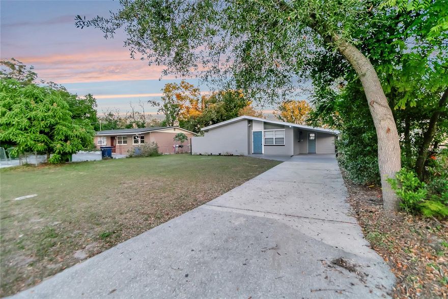 Welcome to this beautifully updated, move in ready dream home! Open floor plan, many updates!  New Roof in 2022/  New AC in 2025!  Fresh Paint New flooring as well as updated fixtures and much more!!!!!  Beautiful water resistant life lock floors throughout. The cook in your house will appreciate the spacious kitchen featuring all wood cabinets and custom Quartz countertops as well as a brand new stainless appliance package. Bathrooms have been fully updated with all new vanities, lighting and plumbing fixtures and custom tile shower surround. The open floor plan makes this home great for entertaining. Great curb appeal and beautiful interior make this home move in ready! Large private lot. Located in the heart of Tampa, this home is close to dining, entertainment, shopping, recreation, Interstate 75, USF, Moffit and much more. Hurry before this is gone.