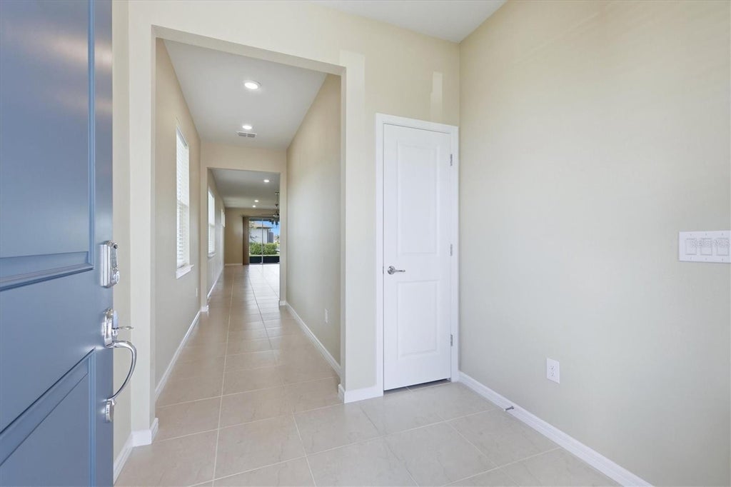 Photo of 8610 Backshore Lane, Parrish, FL 34219 (MLS # A4704869)