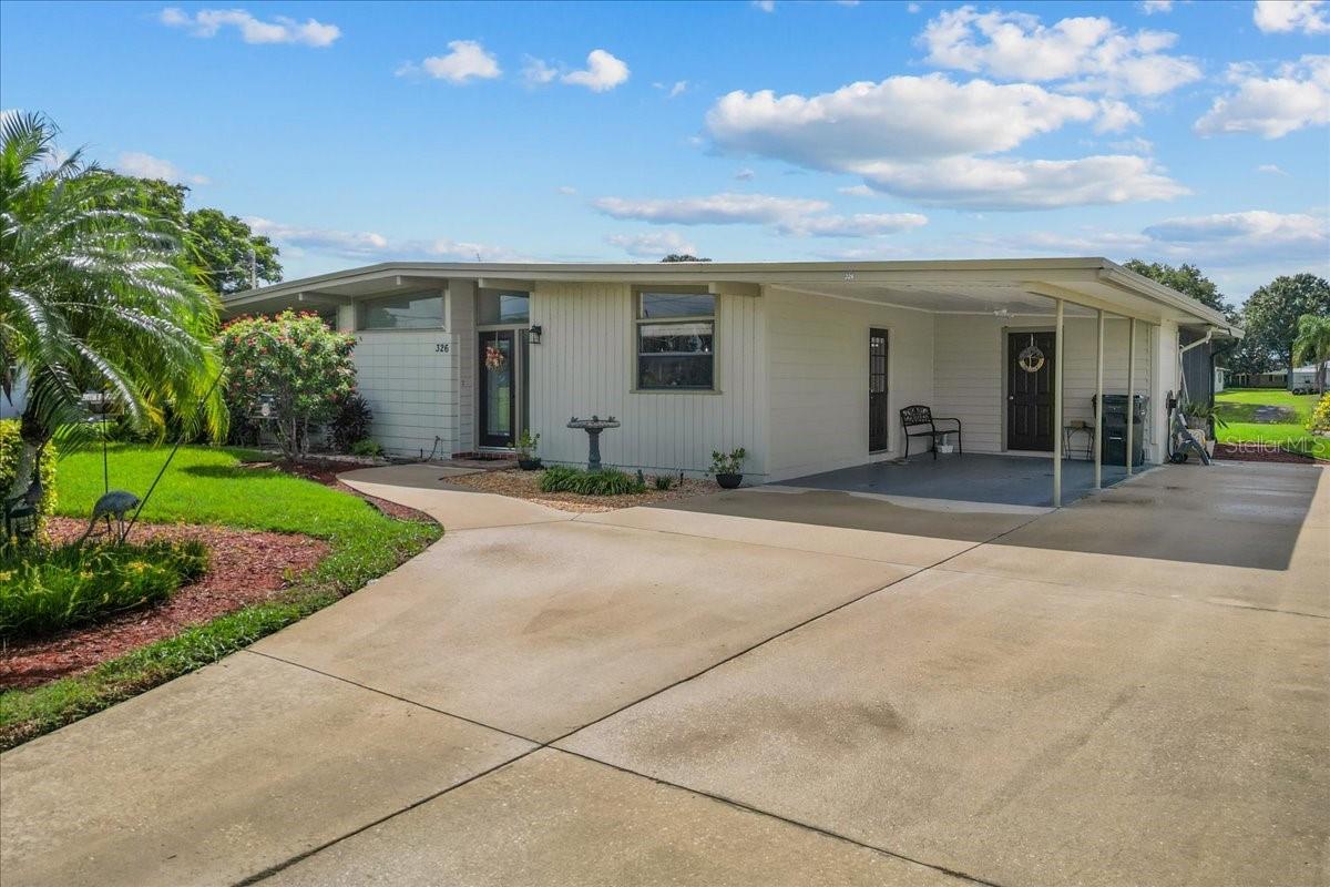 This remodeled waterfront pool home is USDA loan eligible, offering qualified buyers an affordable path to ownership. Featuring 3 bedrooms, 2 bathrooms, and 1,608 sq ft of living space, the property has been thoughtfully updated with a durable membrane roof (2020, recoated 2023), fresh interior paint (2025), and a brand-new hot water heater (2025). Inside, the open floor plan is filled with natural light from walls of windows overlooking the pool and canal. The granite kitchen seamlessly connects to the living and dining areas, while luxury vinyl plank flooring and beautifully finished bathrooms with granite and tile details add a modern touch.
Set on a .32-acre lot, this home is designed for Florida living and entertaining. The expansive outdoor space includes a large screened-in pool, two separate covered patios, and a spacious pool deck with serene water views. The quiet canal provides both privacy and the rare ability to boat directly to Crooked Lake—one of Central Florida’s most sought-after natural lakes. With remnants of the original dock already in place, buyers can rebuild without going through the new permitting process, making this opportunity even more valuable.
Additional highlights include a private irrigation well to help maintain the lawn and landscaping at no added cost, a large powered shed/workshop ideal for storage or hobbies, a peaceful neighborhood with no HOA, and a lifestyle centered around the water. Whether you’re searching for a primary residence or a weekend escape, this home delivers the perfect blend of comfort, convenience, and waterfront living.