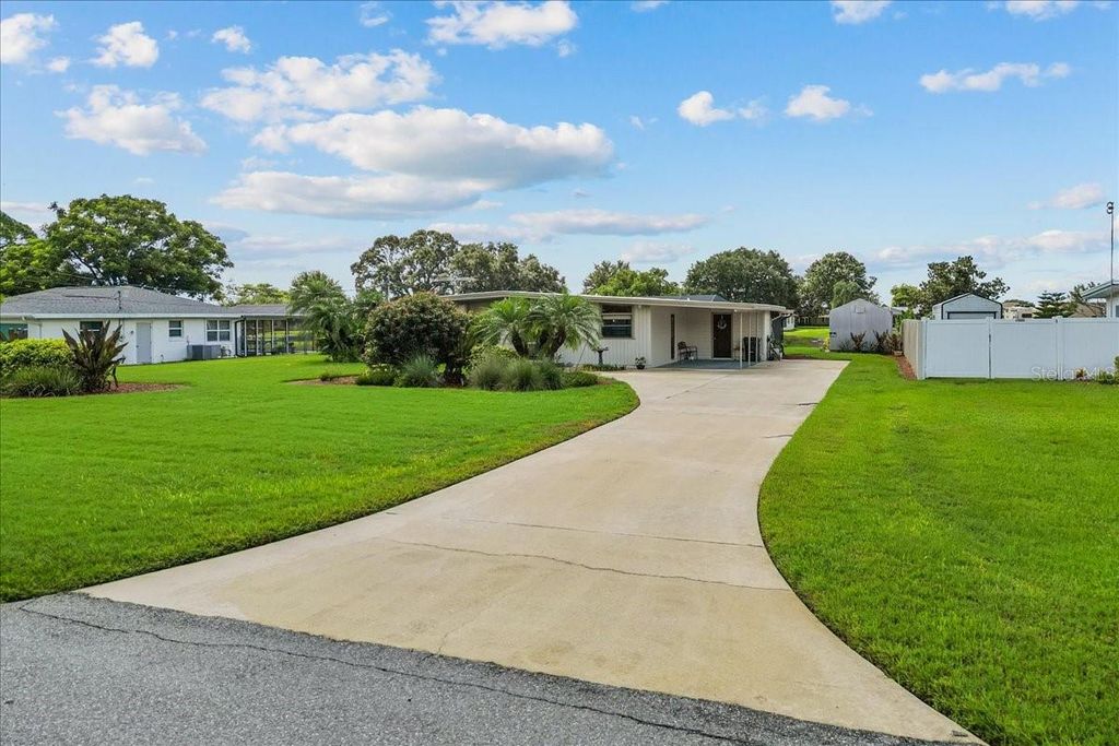 Photo of 326 Canal Drive, Lake Wales, FL 33859 (MLS # P4936079)