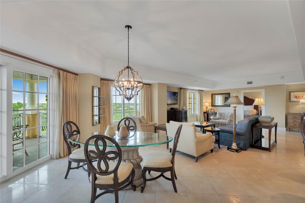 Photo of 7593 Gathering Drive #309, Reunion, FL 34747 (MLS # O6435338)