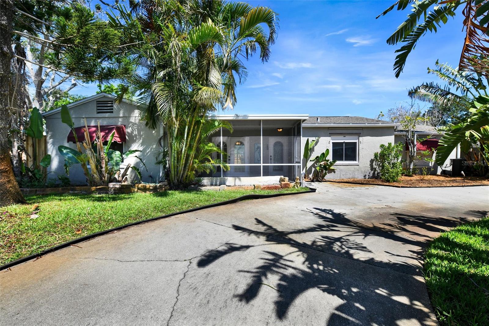 Tucked away on a quiet corner in Gulfport’s sought-after Marina District, this open plan home and pool on 10,000-square feet provide space and privacy that’s increasingly hard to find. Surrounded by mature trees and lush foliage, it’s a tranquil haven just steps from the Clam Bayou Nature Preserve, the Gulfport Marina and two sailing clubs. From there, boaters, paddle-boarders and kayakers have quick access to Boca Ciega Bay, the Intracoastal Waterway, and the Gulf of Mexico.
The property is also walkable to the vibrant downtown that Gulfport is known for; the restaurants, shops, the galleries and all those fun events! On Baywood Point, you’re part of Gulfport’s nautical lifestyle and its artistic soul, with the room to create a home that fits your vision.
Though the existing home was flooded during Hurricane Helene, the substantial damage estimate is under half of structure value, giving you flexibility to renovate or reimagine. Whether you build anew or restore with intention, this is a rare opportunity to claim an iconic property in one of Tampa Bay’s most character-rich communities.