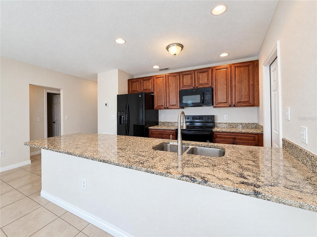Photo of 7606 Leon Avenue, Temple Terrace, FL 33637 (MLS # O6453012)