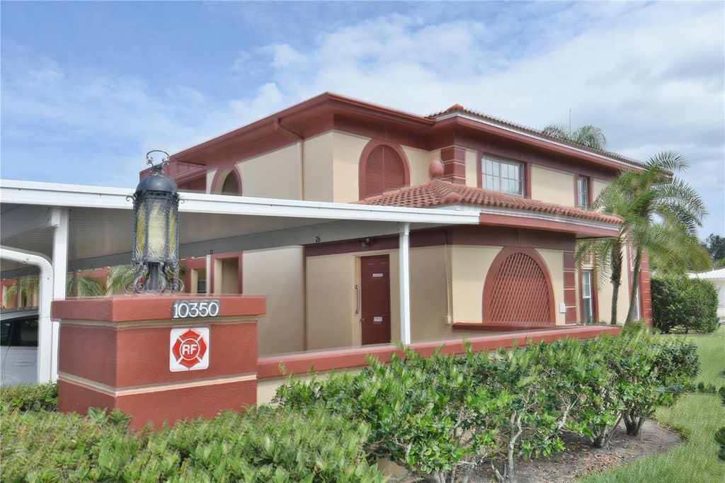 Photo of 10350 Imperial Point Drive W #13, Largo, FL 33774 (MLS # TB8472231)