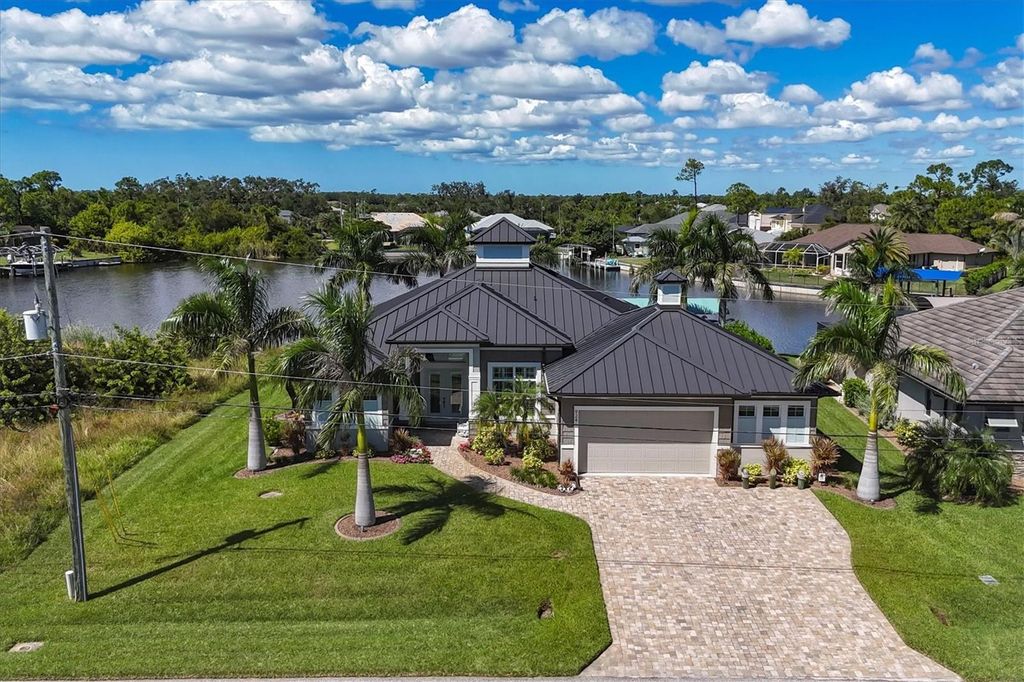 Photo of 9241 Santa Lucia Drive, Port Charlotte, FL 33981 (MLS # D6144321)