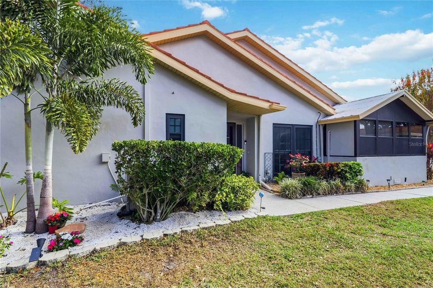 Welcome to 2270 Citrus Court, ideally located on a quiet cul-de-sac in the desirable Villas at Arbor Lakes, a well-established 55+ community in Clearwater. Completely remodeled in 2023, this one-of-a-kind villa showcases distinctive, high-end finishes rarely found in the community. The home features new engineered hardwood floors throughout, a stunning renovated kitchen with new appliances and illuminated quartz countertops, and a cheerful den accented by a custom wet bar and beverage cooler—perfect for entertaining. A spacious three-season room with its own air conditioning adds versatile living space year-round, while the beautifully updated bathrooms offer elegant, modern touches. Additional updates include a newer AC installed in 2019, providing peace of mind. Residents enjoy a truly maintenance-free lifestyle with access to a clubhouse, heated lakefront pool, fishing dock, outdoor gathering areas, and HOA-maintained grounds, along with included cable, internet, trash, and exterior maintenance. Conveniently located near shopping, dining, hospitals, major roadways, and Clearwater’s world-famous beaches, this exceptional home blends thoughtful design, unique upgrades, and carefree Florida living.