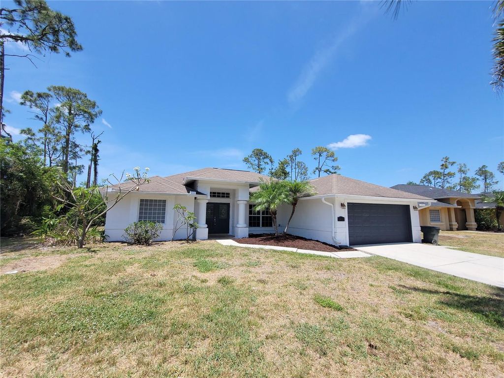 Photo of 1402 Jakway Road, North Port, FL 34288 (MLS # A4642503)