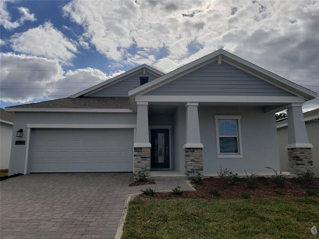 Photo of 5620 Quiet Palm Loop, Saint Cloud, FL 34771 (MLS # O6353233)