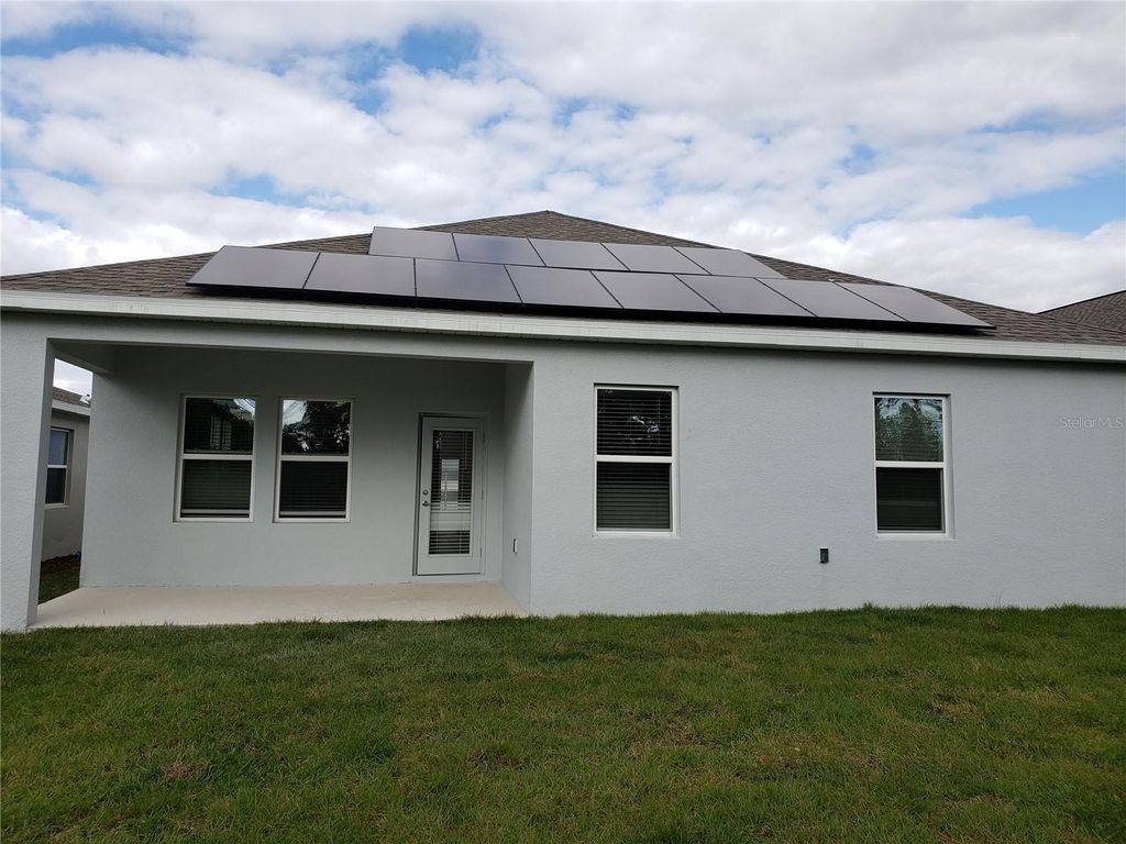 Photo of 5620 Quiet Palm Loop, Saint Cloud, FL 34771 (MLS # O6353233)