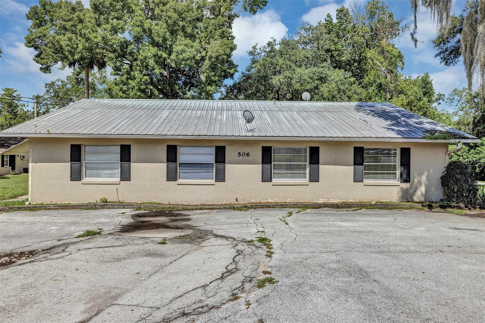 *No Deposit, Partial Deposit, or Full Deposit Options for renters are available — supported by Obligo
Welcome to Unit C at 506 NE 28th Avenue, nestled in a beautiful single-story quadplex set against the lush greenery of Northeast Ocala. This freshly updated unit offers peace, privacy, and convenience all in one.With neutral-toned stucco, classic black shutters, and a durable metal roof, the building has a clean, low-maintenance appeal that complements the natural surroundings.The spacious parking area right in front of the building ensures easy access for residents and guests.Large front-facing windows bring in plenty of sunlight, making the interior bright and welcoming. The property is surrounded by generous yard space—ideal for enjoying a bit of nature or walking your dog.Enjoy the comfort of your own front door .Efficient wall-mounted AC keeps the space cool and comfortable.Transform your culinary space with this stunning kitchen featuring elegant white cabinets and sleek tile flooring. The bright, airy design not only enhances the aesthetic appeal but also creates a welcoming atmosphere for family gatherings and entertaining guests. The durable tile flooring ensures easy maintenance, while the spacious cabinetry offers ample storage for all your kitchen essentials.The warm wood-look countertops provide ample workspace.Appliances include a full-sized refrigerator, electric range, with a deep dual basin sink and matte black faucet completing the setup. A built-in breakfast bar adds additional counter space, perfect for casual dining or entertaining. The open layout flows seamlessly into a cozy dining or living space filled with natural light from large windows, offering a pleasant view of the front yard.The bedroom is generously sized and thoughtfully designed for everyday comfort. Large windows allow natural light to pour in, creating a bright and airy atmosphere. The room features ceiling fan for year-round comfort, neutral tones for easy decorating, and double-door closets for ample storage space. The bedroom offers direct access to the full bathroom, which has been updated with modern tile flooring and a clean white tub/shower combination.The property also offers off-street parking and a grassy front lawn.
Don’t miss your opportunity to own this beautiful home — schedule your showing today!
Qualified renters can skip paying a traditional security deposit and instead use Obligo to secure the home. Standard screening criteria apply. Applicants not qualified for Obligo can still choose to pay a refundable security deposit.
For your peace of mind, all communication regarding this property is handled exclusively by Leasing Florida Property Management. Please be aware of potential scams and avoid sending payments or personal information to unauthorized parties.Visit www.leasingfl.com