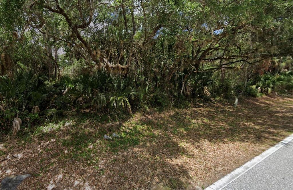 Photo of 281 Shoreland Street, Port Charlotte, FL 33954 (MLS # C7522143)