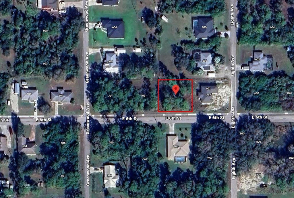 Photo of 705 E 6th Street, Lehigh Acres, FL 33972 (MLS # O6357376)