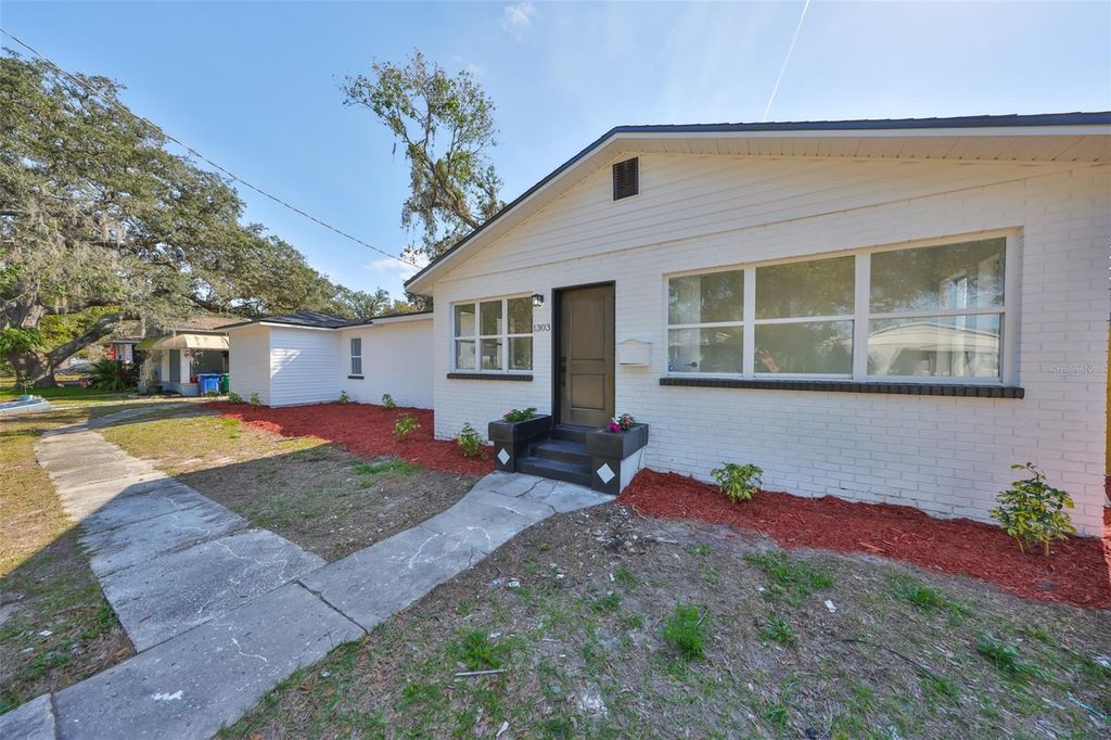 Photo of 1303 E New Orleans Avenue, Tampa, FL 33603 (MLS # TB8442038)