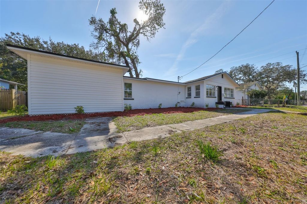 Photo of 1303 E New Orleans Avenue, Tampa, FL 33603 (MLS # TB8442038)