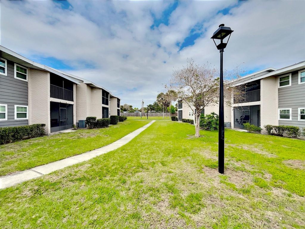 Photo of 865 Sky Lake Circle #D, Orlando, FL 32809 (MLS # O6397482)