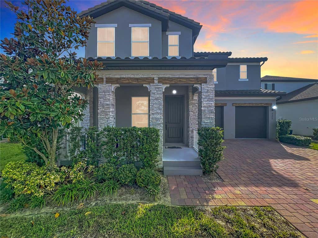 Photo of 9929 Summerlake Groves Street, Winter Garden, FL 34787 (MLS # O6417889)