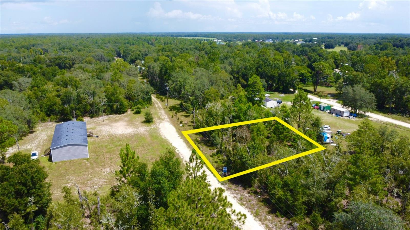Great land opportunity for modular home or perfect place to build your dream home with country living and land privacy, great price and right off U.S. highway 27. Enough room for trailer, boat, 4-wheelers and more. 105'X108' (WXL) lot on side of a hill on a private street, free from flood zone & and no wetland, HOA & CDD free. Lot measurer 0.26 acre (+/- ) & addition 4 adjacent lots for sale separately. Minutes to Bronson and Downtown Williston 10 minute drive to town; grocery, shops and restaurants, in-between US-HWY 27 and NE 60th street.
Great local actives to visit: Horse Riding at Canopy Oak Trails or Williston Horseman's Park, Adventure into Cedar Lakes Woods and Gardens, or Dive into Devil's Den Pre-Historic Spring and Diving Training
GPS Coordinates: 29.416211, -82.541783
Contact the Levy County land development/zoning and planning to discuss building specifications and confirm and use.