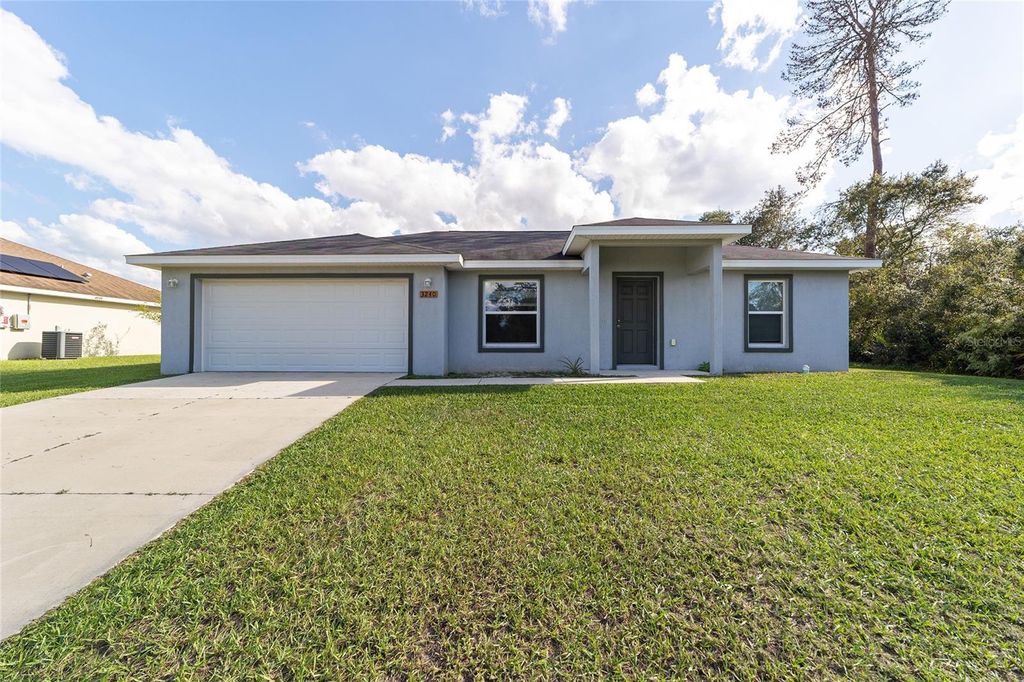 Photo of 3240 SW 129th Loop, Ocala, FL 34473 (MLS # OM712080)