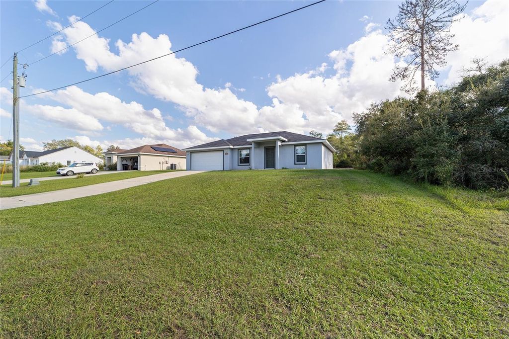 Photo of 3240 SW 129th Loop, Ocala, FL 34473 (MLS # OM712080)