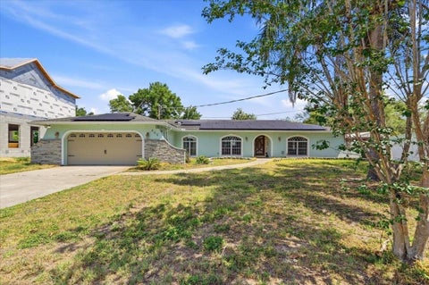 Photo of 450 E Pomelo Street, Lake Alfred, FL 33850 (MLS # P4938688)