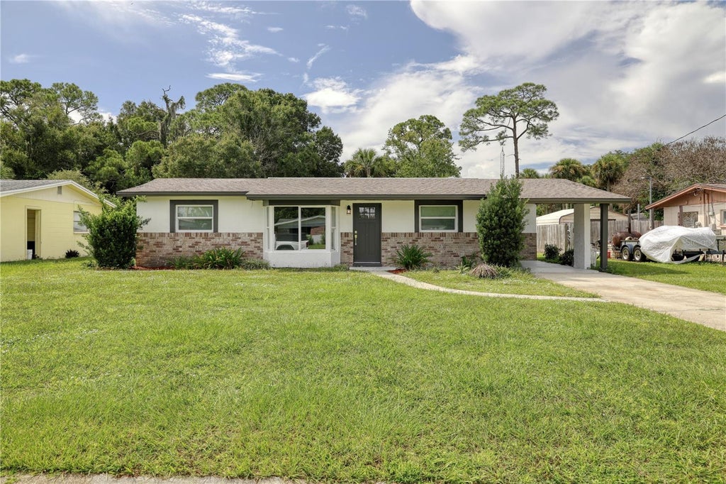 Photo of 1021 Revilla Ln, Rockledge, FL 32955 (MLS # O6443806)