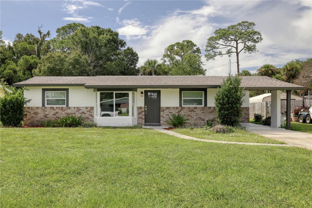 Photo of 1021 Revilla Ln, Rockledge, FL 32955 (MLS # O6443806)