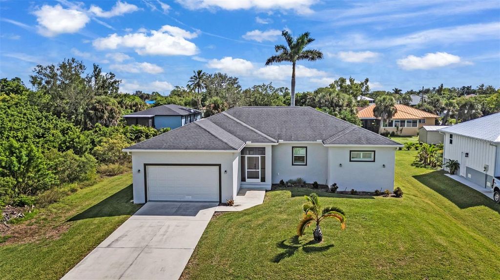 Photo of 3302 Palm Dr, Punta Gorda, FL 33950 (MLS # C7515914)