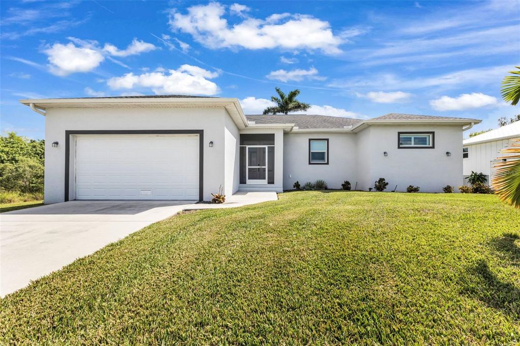 Photo of 3302 Palm Dr, Punta Gorda, FL 33950 (MLS # C7515914)
