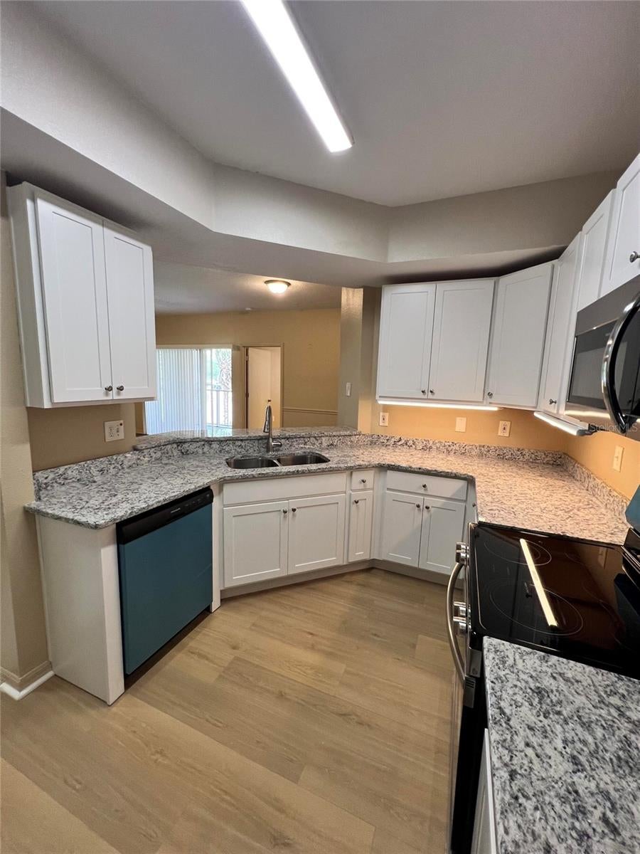 Photo of 5512 Metrowest Boulevard #12-201, Orlando, FL 32811 (MLS # O6438847)