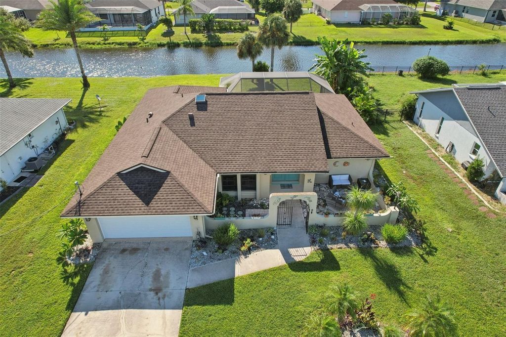 Photo of 13 Bunker Lane, Rotonda West, FL 33947 (MLS # TB8427965)