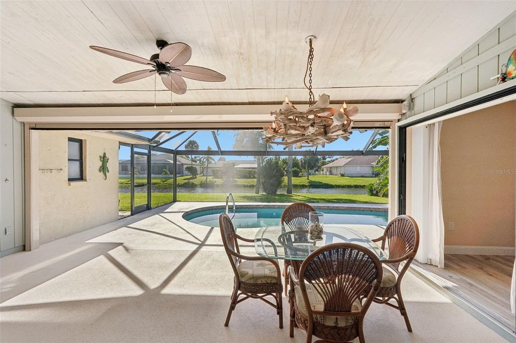 Photo of 13 Bunker Lane, Rotonda West, FL 33947 (MLS # TB8427965)