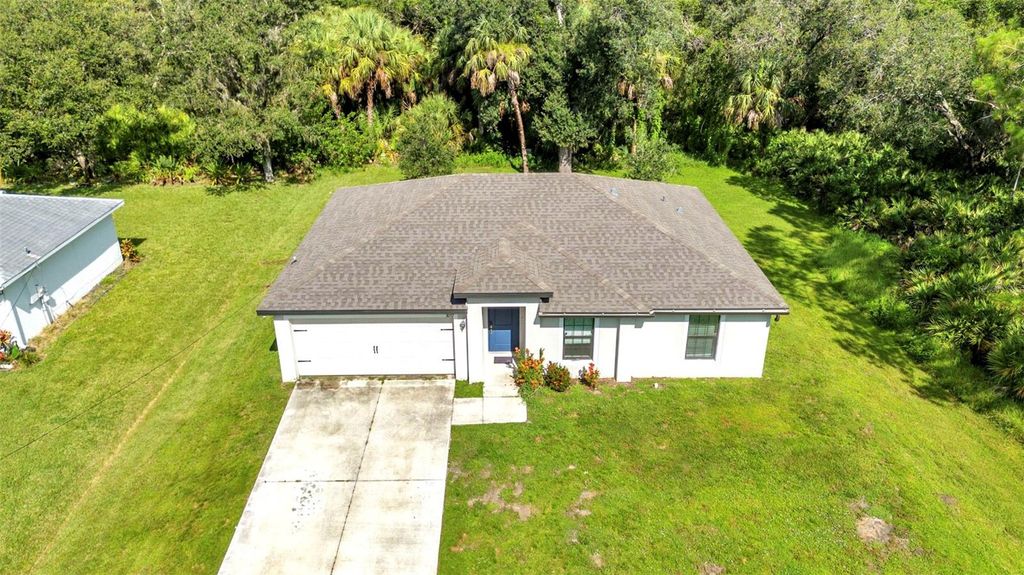 Photo of 3057 Stowe Terrace, North Port, FL 34286 (MLS # C7524638)