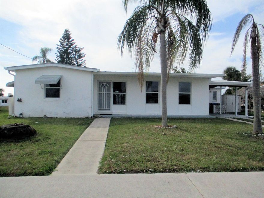 This is it! Your opportunity to live in Paradise AND perfect for remodeling to your vision of Paradise. This home offers 3 bedrooms and 2 baths, public water and sewer, new microwave and ceiling fans in bedrooms and living room, plus plumbing repairs in both baths, and new A/C installed on 9/2025. Gutters, downspouts, soffit, and fascia were replace in January 2026. Large lanai provides great sunset views, and the canal provides direct access via your boat to the Gulf with only 1 fixed bridge at El Jobean on SR776. Plus a new dock for your boat. Quiet neighborhood within minutes of dining, shopping, medical facilities (in January 2025 Sarasota Memorial approved the building of a new hospital in North Port), schools, parks, and recreation activities including beaches, boating, fishing, golf, bicycling, and the spring training facilities for the Atlanta Braves and the Tampa Bay Rays baseball teams. Minutes from Warm Mineral Springs. Conveniently located near U.S. 41 and I75 making visiting Sarasota, Tampa, St. Pete, Fort Myers, and Naples easy. Come take a look and start your adventure in the sunshine.