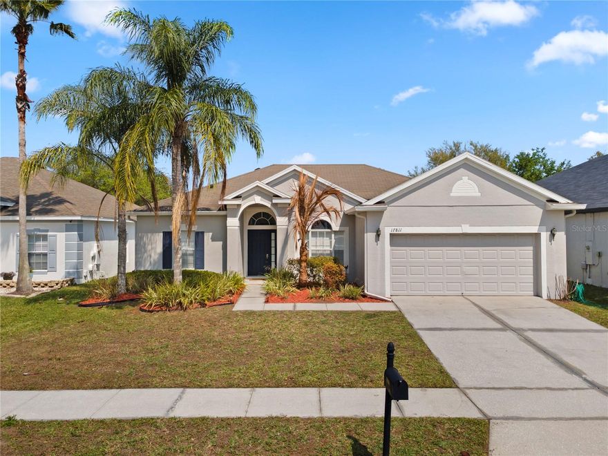 *NEW ROOF COMING SOON!* Welcome to this beautifully maintained, 3-bedroom, 2-bath home located in the highly desirable Crystal Lakes community of East Orlando. The home sits within a well-manicured neighborhood known for its peaceful atmosphere, attractive landscaping, and strong community appeal. Step inside to discover a bright, open-concept layout that seamlessly flows through the main living areas, with arched walkways and plenty of natural lighting through plantation shutters. At the heart of the home is the upgraded kitchen, featuring dark wood cabinets with crown molding, tile backsplash, SS appliances, granite countertops, recessed and pendant lighting, and an oversized prep island overlooking the family room. AC replaced in 2022. The formal dining room is conveniently located just off the kitchen. Owners can escape to their primary suite, with a tray ceiling, a walk-in closet, and an upgraded private bathroom. The spa-like primary bathroom features his-and-hers sinks, granite countertops, a glass walk-in shower with stunning tile work, and a garden tub. Two additional bedrooms share a second bathroom with matching granite countertops and a shower/tub combo. Step outside the French doors from the family room, onto the brick-paved, outdoor patio & fully fenced backyard, providing privacy and space for pets or gatherings & also ideal for relaxing or entertaining. Located in the master-planned Cypress Lakes community, residents enjoy access to resort-style amenities, including a Community pool, Tennis courts, a Clubhouse with fitness facilities, and multiple Playgrounds and green spaces.  This versatile and inviting home in one of East Orlando’s most sought-after communities delivers comfort, convenience, and value. Since the home is within proximity to the University of Central Florida and a moderate drive to Downtown Orlando and the Space Coast beaches, it provides an opportunity for both homeowners and investors seeking stable appreciation and rental potential. With its unique bonus spaces, fenced yard, and access to top-tier amenities, this home is ready to meet a wide range of lifestyle needs. Act now - Schedule a showing today!