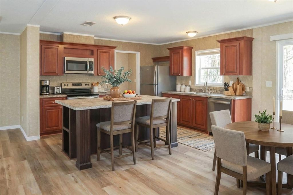 Photo of 6102 Woodhaven Drive, Lakeland, FL 33811 (MLS # TB8471987)