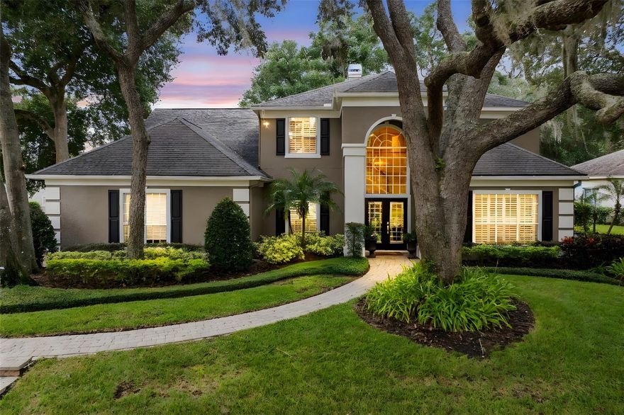Under contract-accepting backup offers. Jump into the lap of luxury! 
Drive up to this majestic gem on a sprawling  .29 acre corner lot in sought after Tuscawilla. Astounding high end upgrades fill this traditional two story gem. Your tour begins via double leaded glass doors with a giant Palladian window above. You will be greeted by a grand two story foyer and artful staircase.  Custom millwork including 10” crown molding,  wainscoting and window trim plus designer window treatments and custom light fixtures are found throughout the home. Newer high end luxury plank flooring adorns most of the downstairs. The traditional  floor plan is multi-purpose allowing flexibility to suit your lifestyle. A large office at the front of the home features French doors and custom built-ins. This room could also be a formal living room or media room. A magnificent dining room is open to the foyer, family room and kitchen. The jaw dropping family room features a two story ceiling with dramatic glass transom windows all the way up and a floor to ceiling fireplace with custom quartz tile chimney surround and an artsy reclaimed wood mantle. New double payne sliding doors lead to a phenomenal resort style solar heated pool and spa plus an extravagant covered outdoor lounge and dining space with fireplace and full summer kitchen, all overlooking completely refurbished pool and massive back yard. 
A recent kitchen remodel features a quartz topped custom dining/ chef’s island, high end cabinetry, quartz counter tops, large hidden walk in pantry with cabinet door front, appliance garages, excellent appliances, custom hood vent, recessed lighting, and a wine fridge. Wide custom French doors lead to the outdoor entertainment space. The master suite is a lovely retreat with updated glass doors leading to the pool and an updated bathroom with high end finishes such as custom vanities, stylish mirrors and spectacular walk in shower with custom accent wall, plus a large walk in closet with custom built ins. 
Head up the stunning designer staircase to the second story featuring three additional bedrooms (two of them are 15x13) and a bonus room with storage closet. An updated full bathroom features a double vanity with granite countertops, designer tile and tub with shower. The bonus room has a storage closet and has the potential of being a 5th bedroom if needed. This impressive  home invites you for a visit! Come see it today and make it yours!