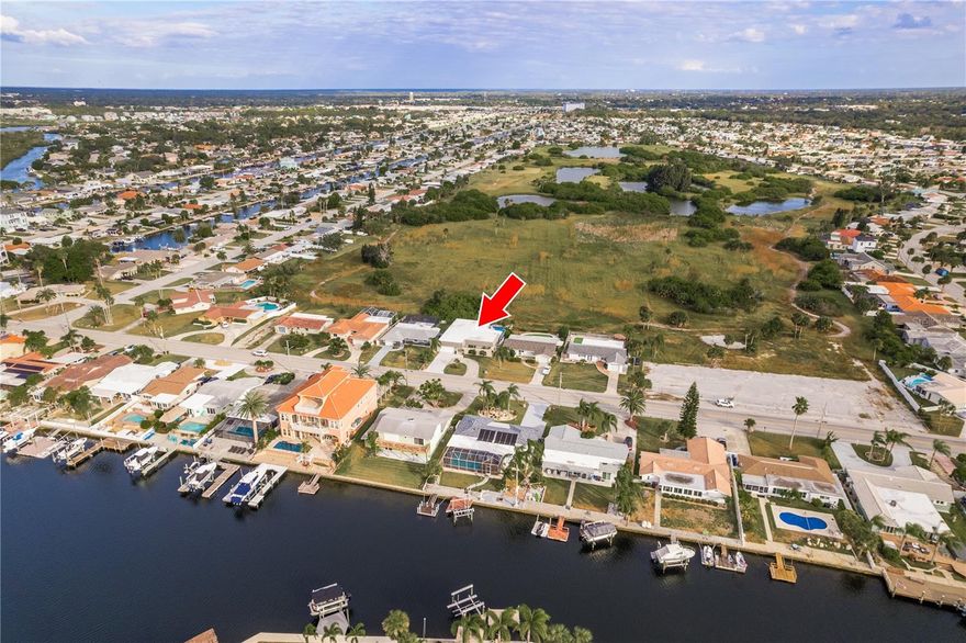 Experience the epitome of luxury living and welcome to the esteemed Gulf Harbors waterfront community in this remarkable 3-bedroom, 2-bathroom oasis! Embrace a lifestyle of comfort and sophistication in this one-of-a-kind property, complete with a 2-car garage and a backyard sanctuary with MEGA privacy. 

Step into a MOVE IN READY, turnkey home featuring a multitude of recent upgrades, including 2023 hurricane-resistant windows and a front door that offer both security and tranquility. Marvel at the newly installed floors that guide you through freshly painted walls and ceilings, showcasing a 2022 renovation. Enjoy the seamless ambiance complemented by the removal of popcorn ceilings, updated canned lighting, and brand-new ceiling fans, providing a modern and welcoming atmosphere.

The house boasts two updated bathrooms and an enhanced indoor laundry room, highlighting the attention to detail in this abode. Take delight in the 2022 saltwater pool system, a new pool heater, and pump that create a delightful oasis in the backyard. Revel in the brand-new Catalina deluxe hot tub and the 2019 Sunlight 3-person Infrared sauna, enhancing the home's luxurious amenities.

Beyond the aesthetics, significant infrastructure improvements include an upgraded electrical system with a new 200-amp panel and enhanced spa electricals. The 2021 water treatment system, 2023 updated HVAC, a new hot water tank, and the 2019 roof all promise efficiency and peace of mind.

This property offers more than just a comfortable living space—it's a haven for entertainment and relaxation. The layout is highly desired, with a split floor plan and a Master suite, which includes a walk-in closets with built in shelving, a gorgeous en-suite bathroom, and direct access to the backyard oasis.  A cool pool table, complete with cues, balls, and chalk, is included in the home. Outside in the stunning backyard you'll love the top-of-the-line landscaping, landscape lighting, a pool safety fence, and mega privacy, offering a serene and private escape. The backyard is also enclosed with child and dog safety in mind without blocking the beautiful scenery. 

Enjoy staying home and the experience of a spa-like backyard that encompasses a hot tub, sauna, and a pool table for your enjoyment. In a very active community that has the only private beach on all of Florida's Gulf Coast which is only available to Gulf Harbors Resident at a very affordable fee of $180 a year. The neighborhood is also golf cart friendly and centrally located to lots of shopping, restaurants, and minutes from downtown New Port Richey. Also the HOA is optional and only $125 a YEAR, complete with 2 private boat ramps! Don't miss this extraordinary opportunity to own a home where luxury and entertainment converge harmoniously, offering a lifestyle beyond compare.