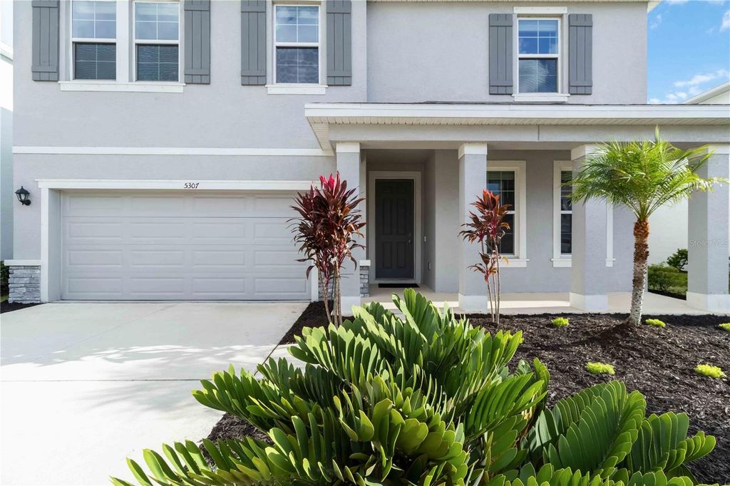 Photo of 5307 Grove Mill Loop, Lakewood Ranch, FL 34211 (MLS # A4666946)
