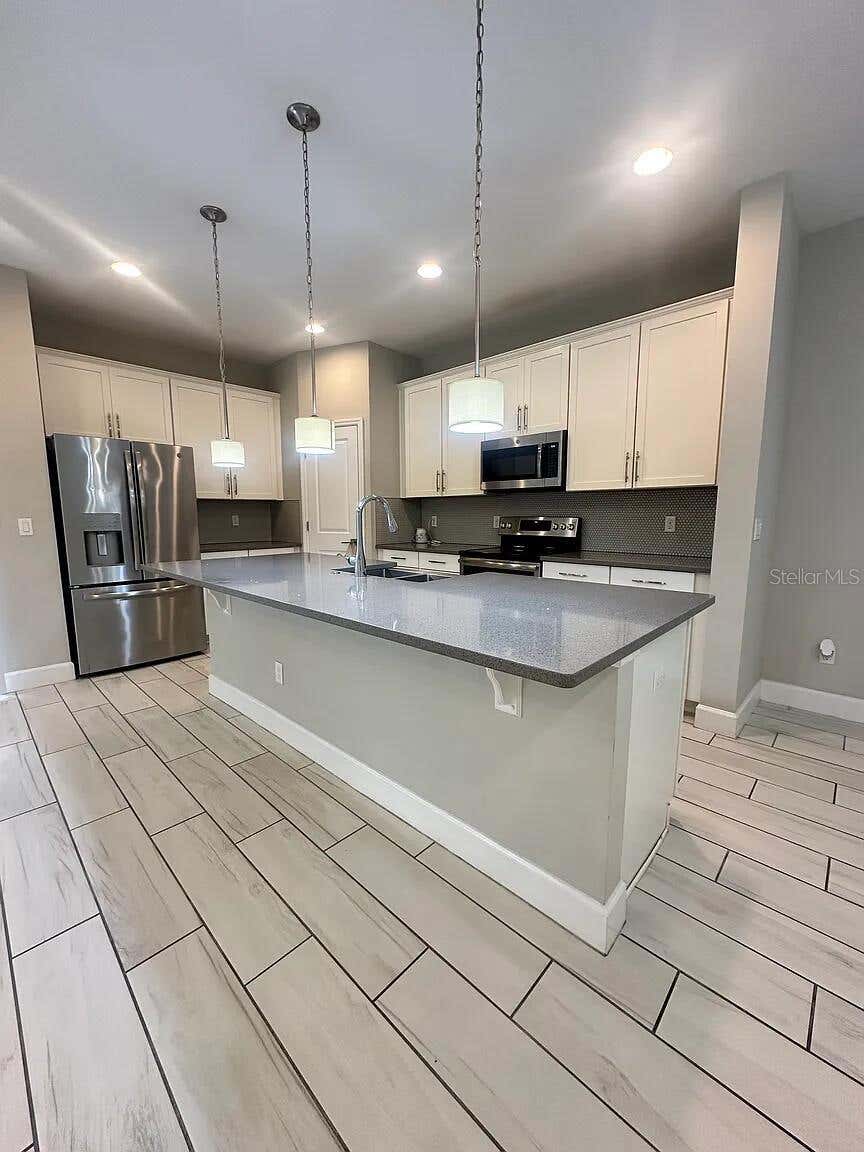 Photo of 534 Lake Wildmere Cove, Longwood, FL 32750 (MLS # O6431308)