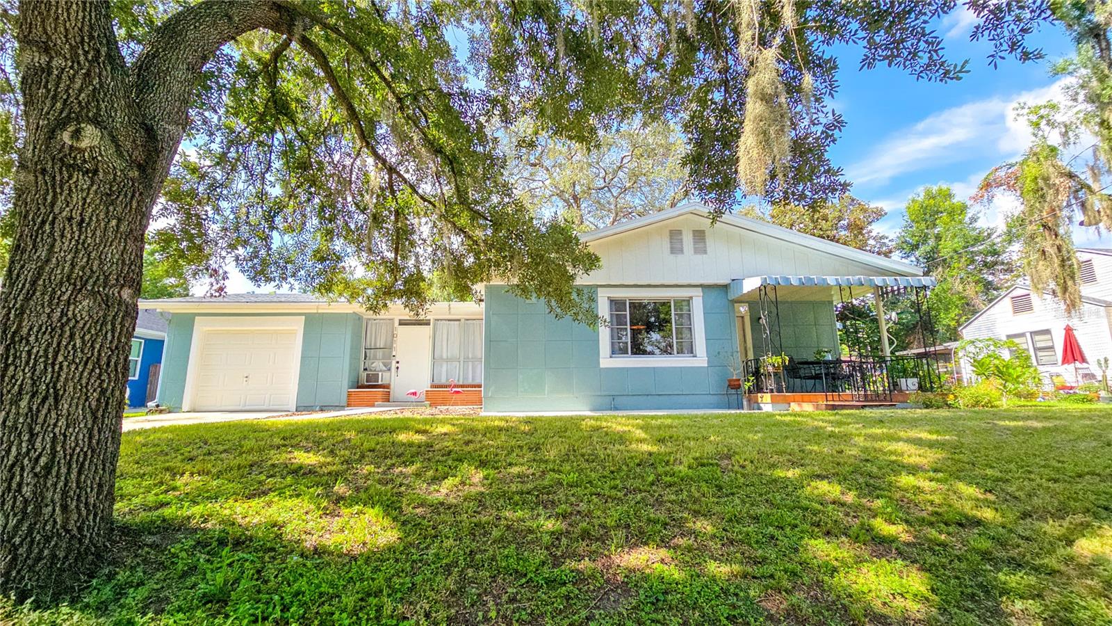 A Rare Piece of American History: 1950s Lustron Home in Tampa
This is an extraordinary opportunity to become the steward of architectural history. Welcome to Tampa’s iconic Lustron home – a favorite on the Seminole Heights Homes Tour and one of only a few remaining in Florida. These remarkable prefabricated enameled steel houses were developed in the post-World War II era by inventor Carl Strandlund’s Lustron Corporation, specifically designed for returning G.I.s. This 1950s treasure remains in pristine condition, just as stunning as the day it emerged from its shipping container and was assembled.
Say goodbye to termite worries forever! This home features exterior steel panel construction, interior steel beam wall structure, and steel beam roof construction. Only the garage and addition use traditional wood framing. In Florida’s termite-prone climate, this steel construction is genius – imagine never having to worry about structural termite damage again!
The original spacious 2-bedroom, 1-bathroom layout offers exceptional flow for entertaining with a large, open family room seamlessly connected to the dining area and charming pass-through window to the kitchen. The kitchen boasts a stunning oversized enameled sink, abundant cabinet storage, and dedicated space for refrigerator, washer, and dryer. You’ll even find the fascinating original heating system motor as a unique historical feature. A smart rear addition includes a convenient half-bathroom and versatile studio space.
Prepare to be amazed by storage solutions – a rarity in homes of this era. Built-in storage throughout, multiple thoughtfully designed closets, and even the main bathroom features an extra-large storage cabinet. The enclosed breezeway between house and garage includes air conditioning, perfect for relaxing. The expansive yard is ideal for entertaining with endless possibilities on this huge lot.
This isn’t just a home – it’s a piece of American history you can actually live in. The preservation and condition of this Lustron home is remarkable, offering the perfect blend of historical significance and modern livability. Don’t miss this once-in-a-lifetime opportunity to own a true architectural treasure that combines historical significance with practical, termite-free living in the heart of Tampa.